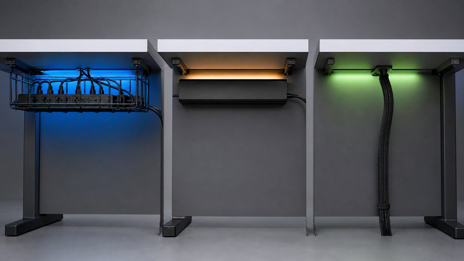 Under-desk comparison of an open cable tray, enclosed raceway, and braided cable sleeve