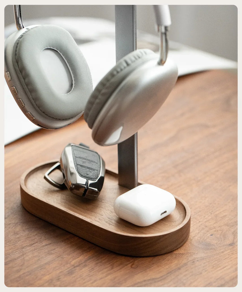 Wood headphone stand holding over-ear headphones