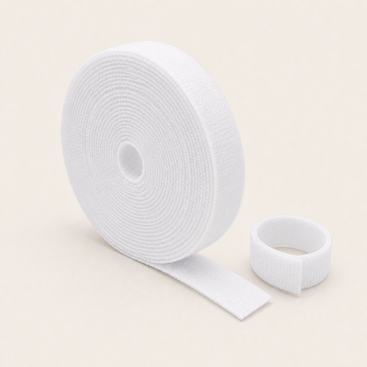 White reusable hook-and-loop cable wrap roll